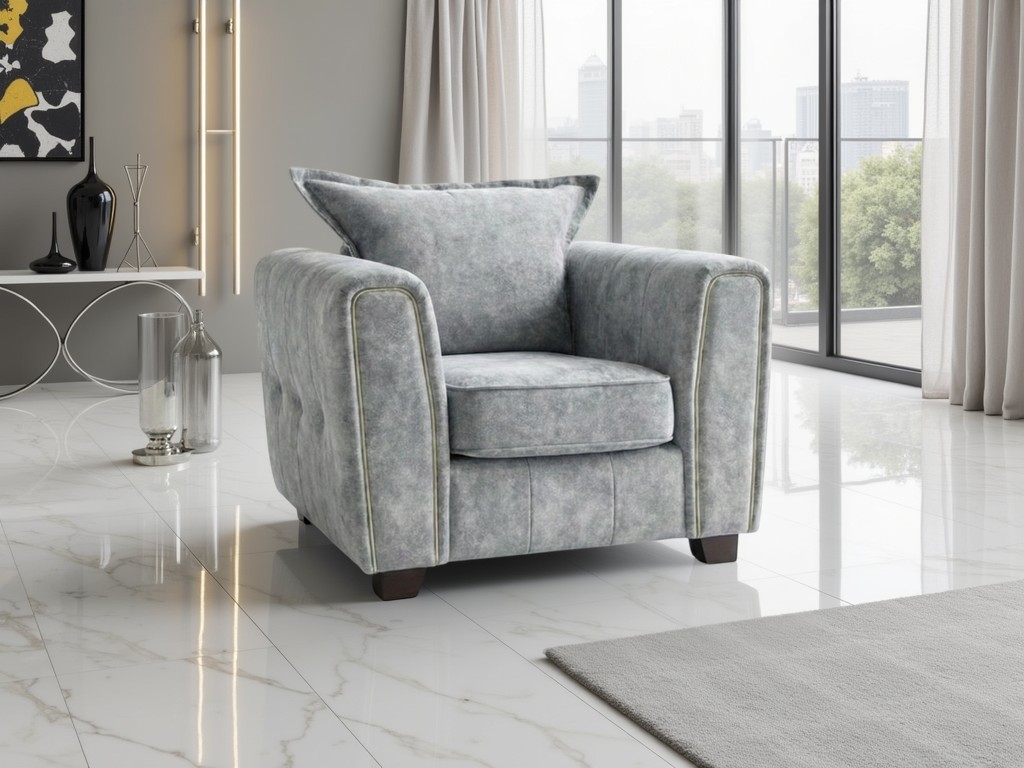Serena Elegant Fabric Armchair with Metal Trim and Quilted Sides