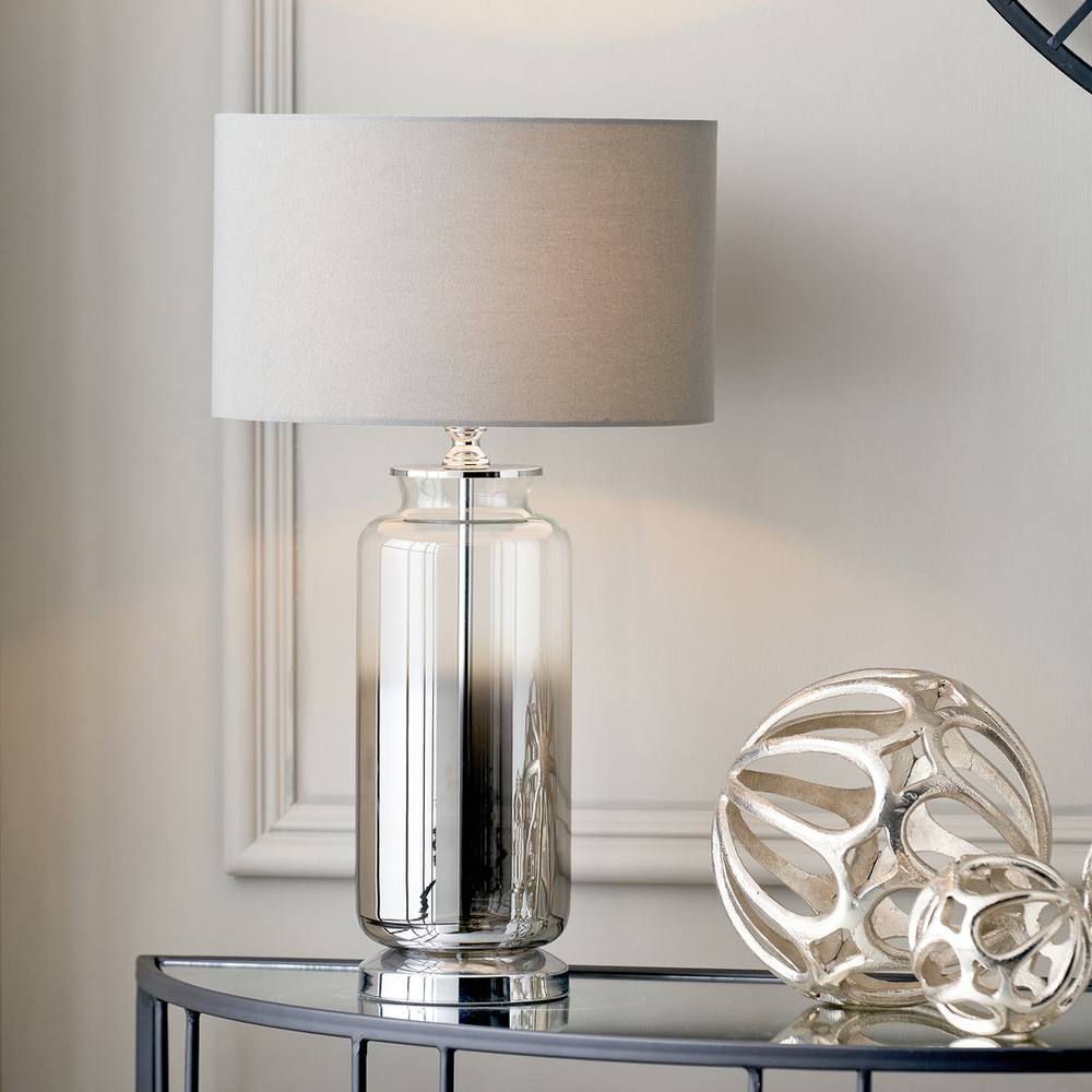 Ruma Glass Cylinder Table Lamp With Gold Detail And White Lampshade In Grey